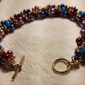 Hand beaded bracelets called holiday baubles